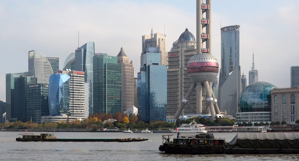 Lujiazui skyscrapers and the Oriental Pearl Tower seen across the Huangpu River from the Bund
